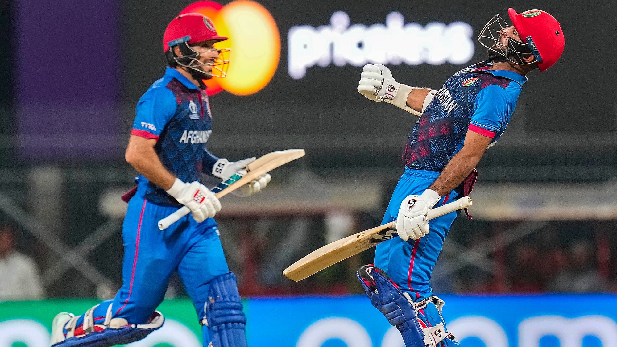 <div class="paragraphs"><p>Afghanistan's captain Hashmatullah Shahidi and Rahmat Shah celebrate after winning the ICC Mens Cricket World Cup 2023 match against Pakistan, at MA Chidambaram Stadium in Chennai, Monday, Oct. 23, 2023.</p></div>