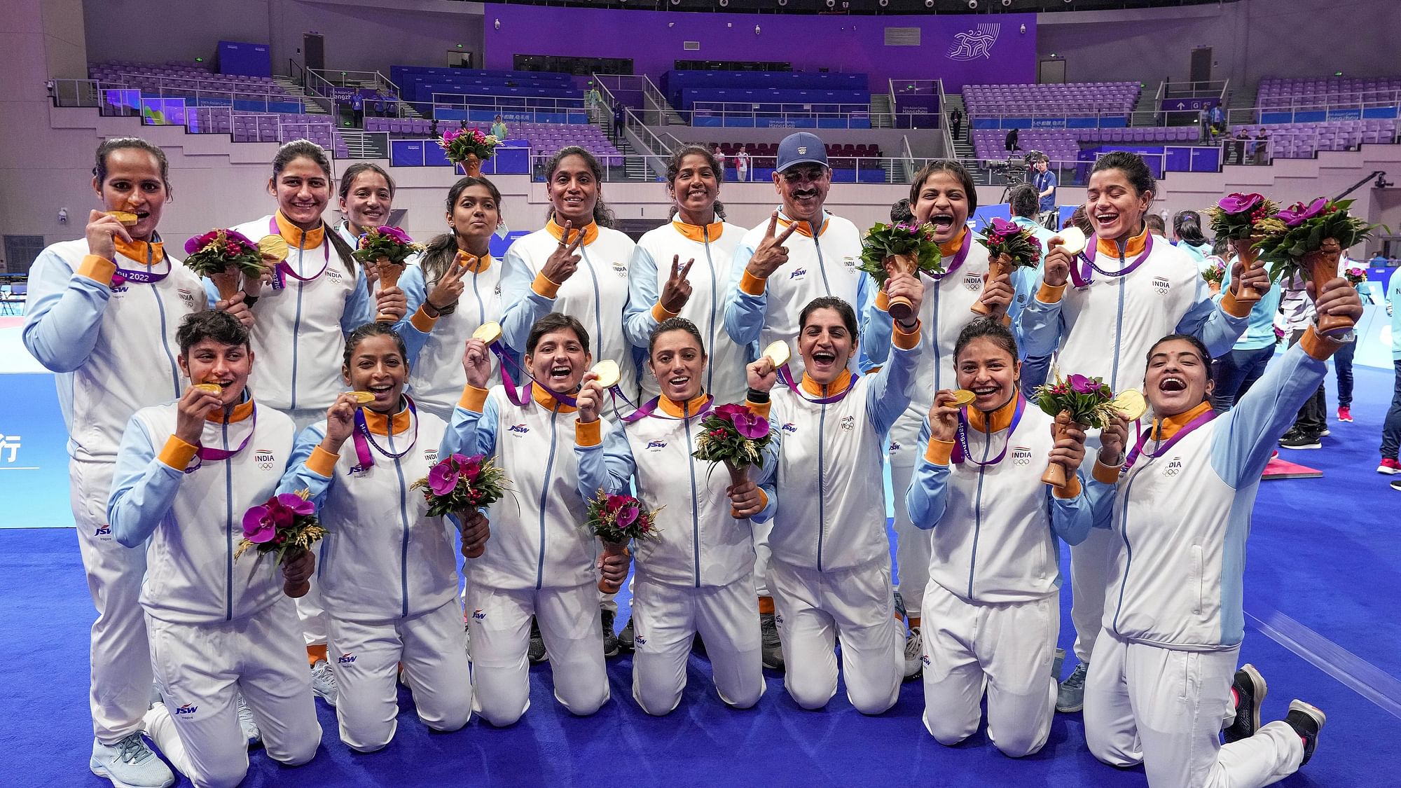 <div class="paragraphs"><p>Hangzhou: Gold medalist Indian team pose for photos during the presentation ceremony after the Women's Team Gold Medal Kabaddi match against Chinese Taipei at the 19th Asian Games, in Hangzhou, China, Saturday, Oct. 7, 2023. </p></div>