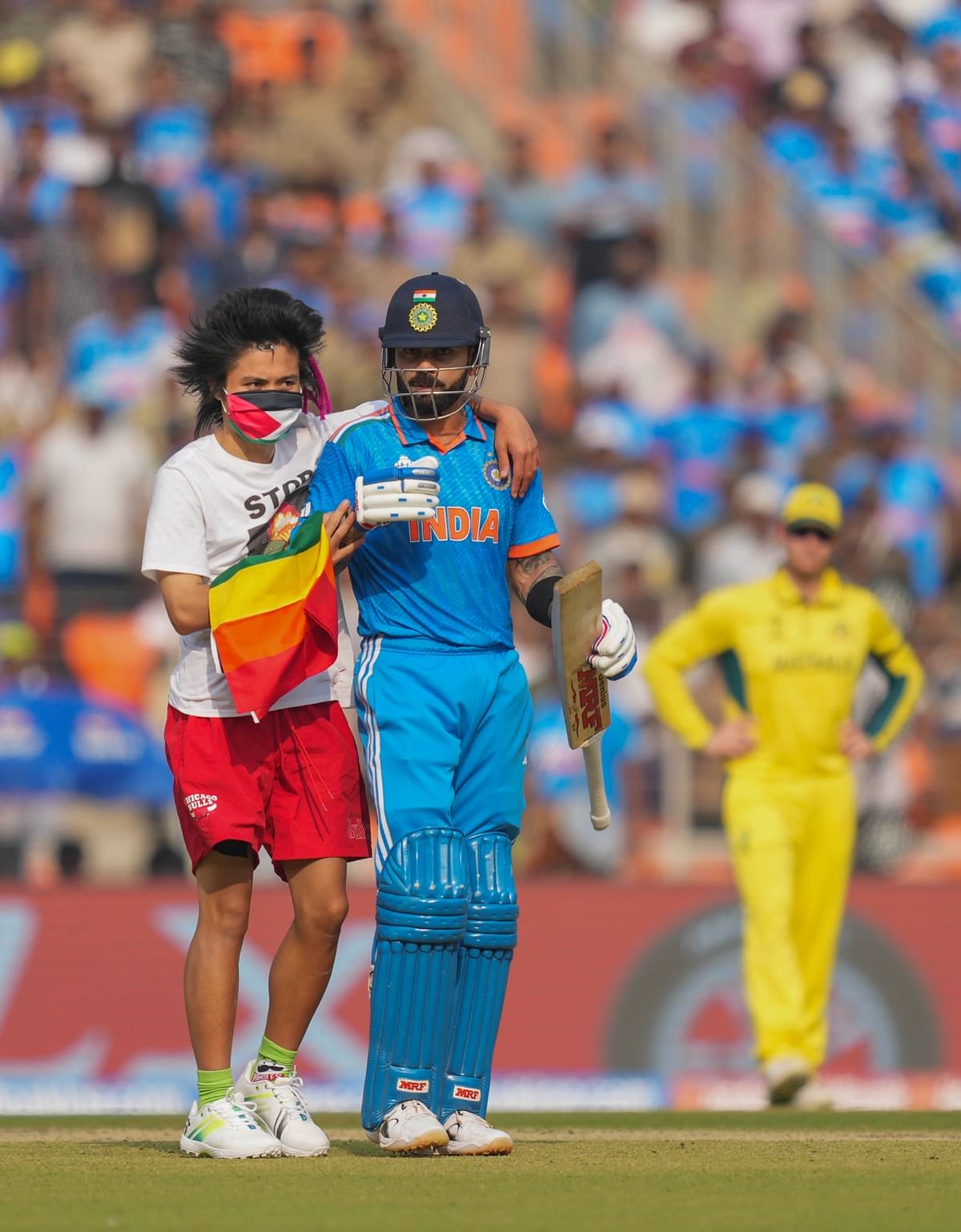 The man was seen trying to hug Virat Kohli – who was one of the batsmen on the pitch.