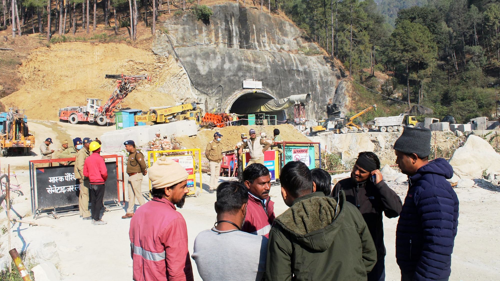 <div class="paragraphs"><p>Rescue officials at the entrance of the  Silkyara tunnel during  rescue operations on Saturday, 25 November, to save 41 workers trapped inside.</p></div>