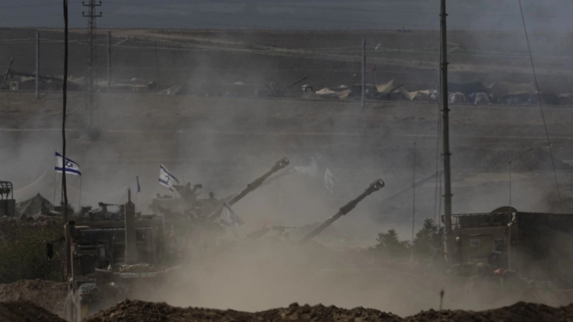 <div class="paragraphs"><p>Israeli artillery fires near the border with the Gaza Strip on Tuesday, 31 October, 2023.</p></div>