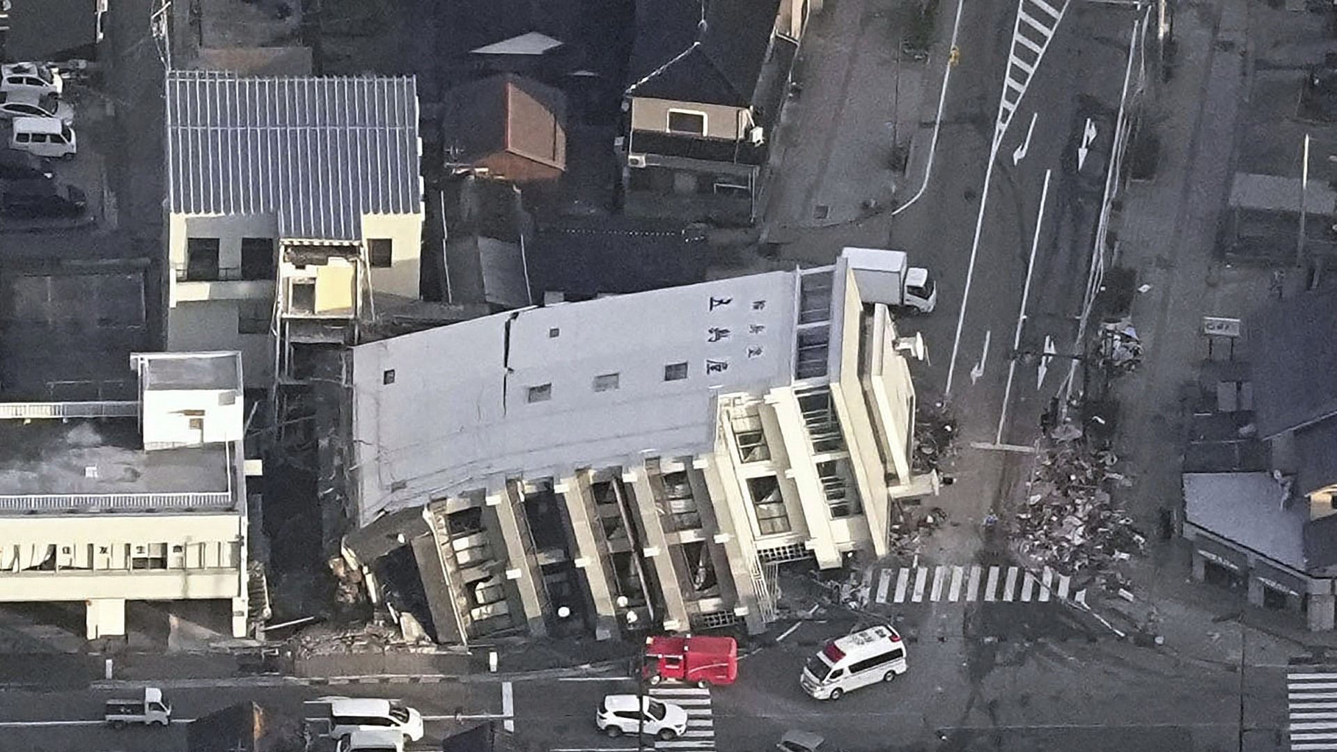 <div class="paragraphs"><p>A building falls on the ground following an earthquake in Wajima, Ishikawa prefecture, Japan on Monday, 1 January.</p></div>