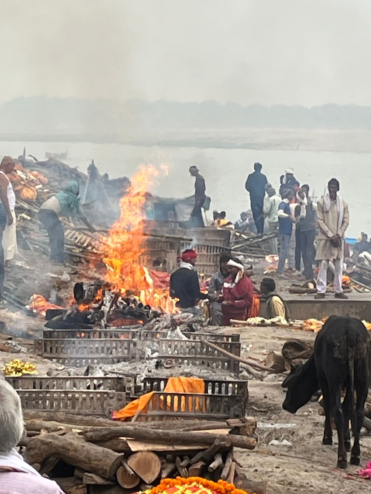 An estimated 100 bodies are cremated daily at Manikarnika, where a pyre burns 24 hours a day, 365 days a year. 