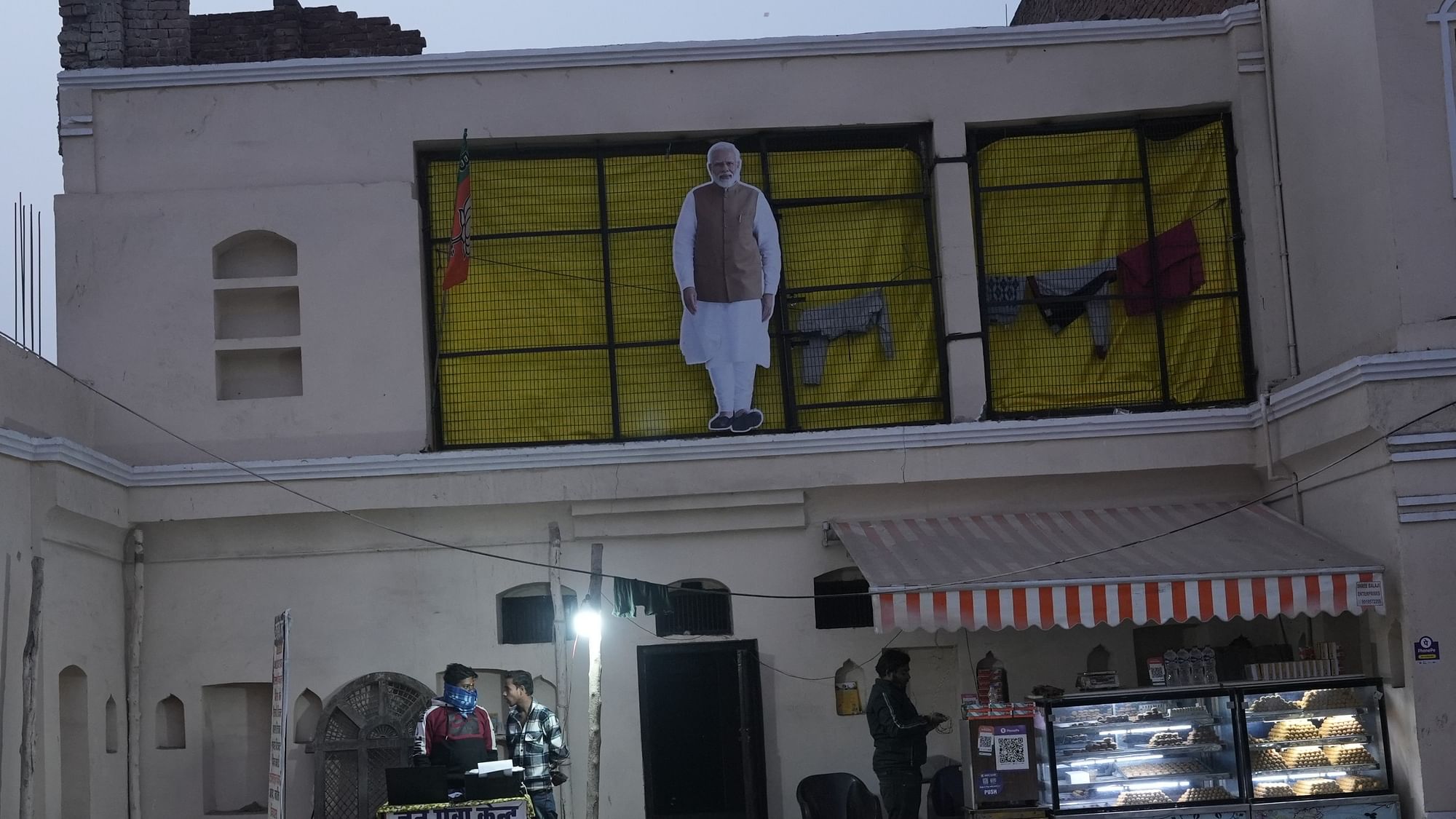 <div class="paragraphs"><p>A life-size cutout of Prime Minister Narendra Modi outside a house in Ayodhya, Uttar Pradesh.</p></div>