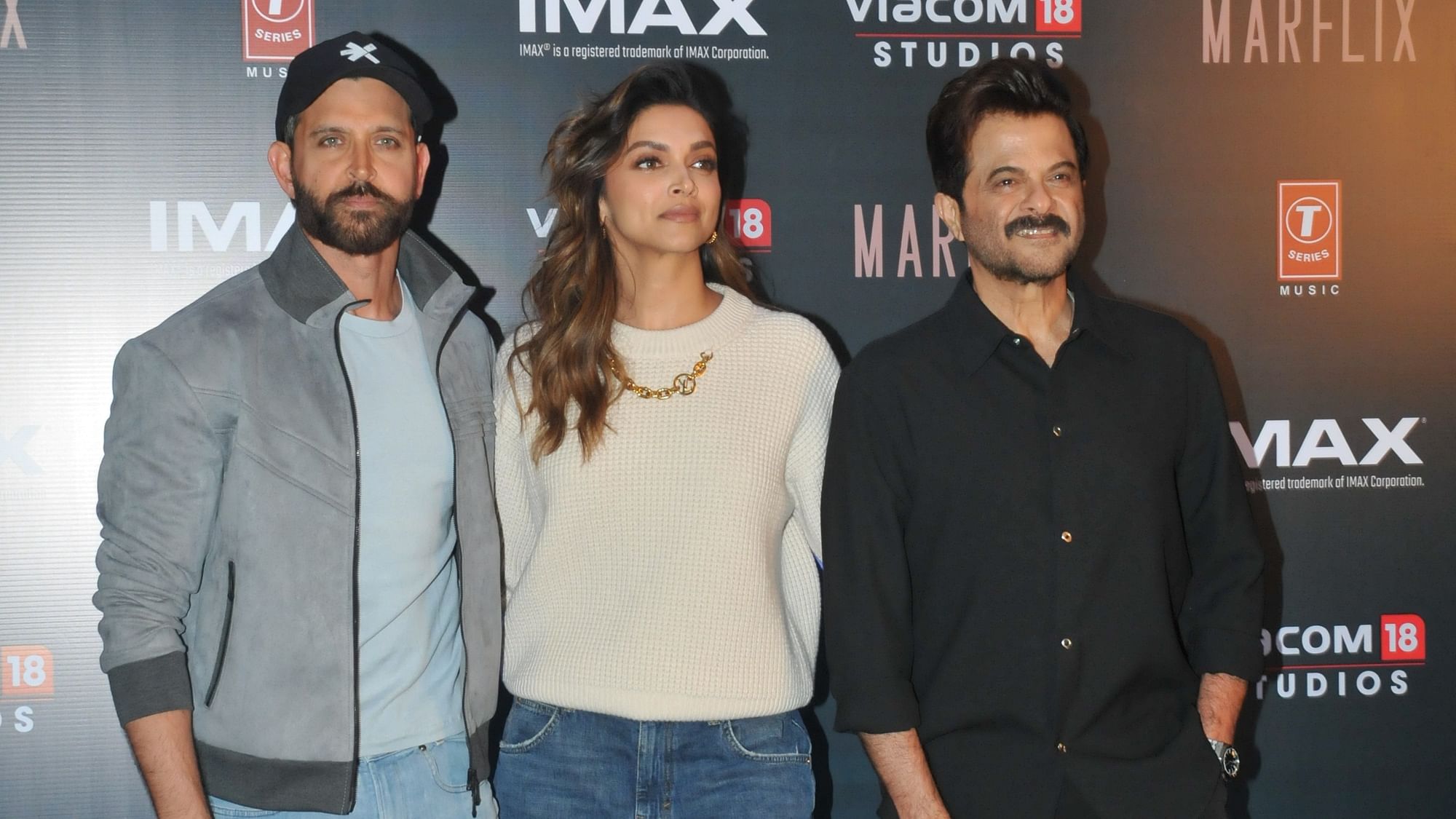 <div class="paragraphs"><p>Hrithik, Deepika and Anil were all smiles for the shutterbugs at <em>Fighter's</em> promotional event.</p></div>