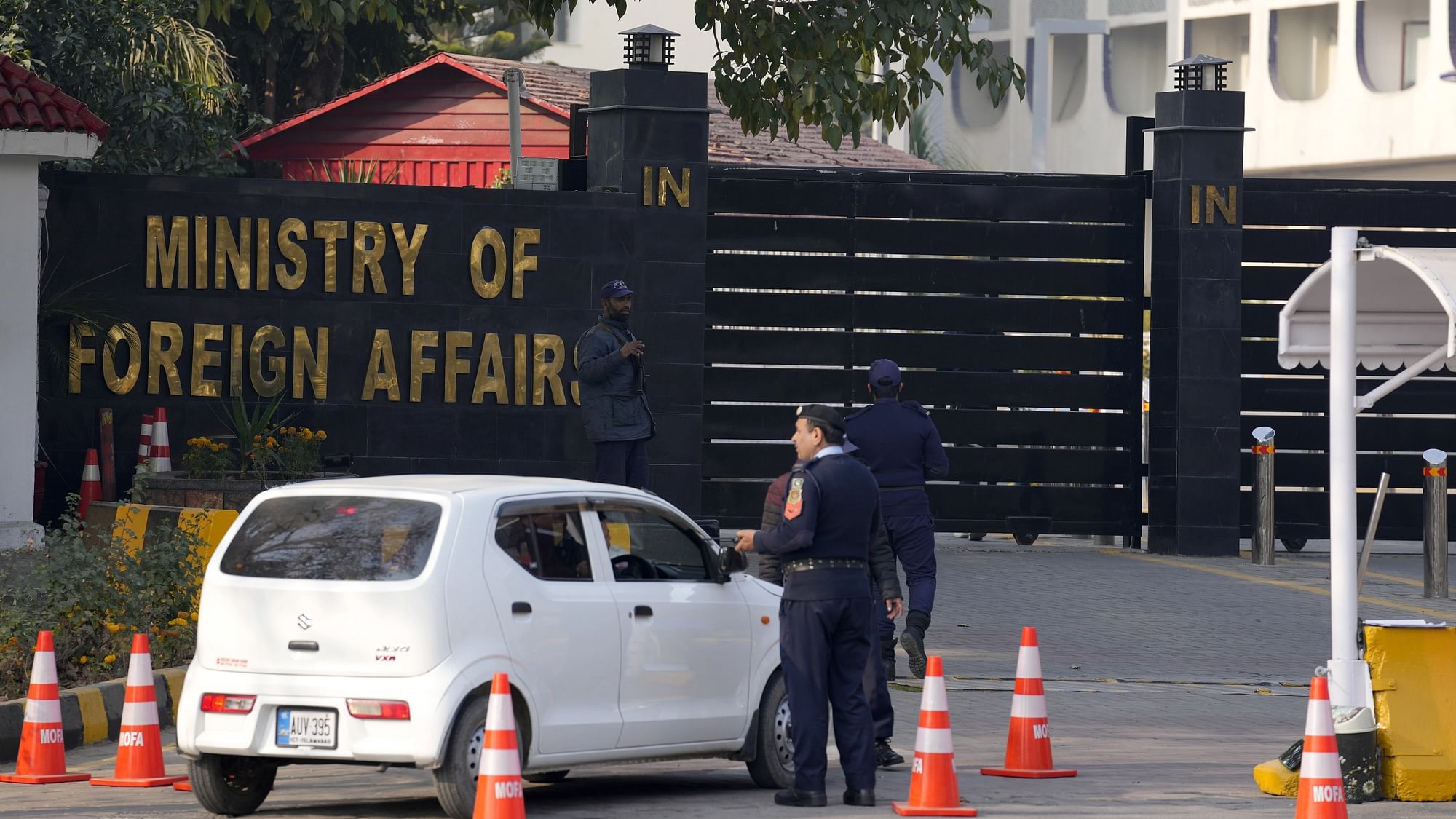 <div class="paragraphs"><p>Police officers search a car at the main entry gate of Pakistan's Ministry of Foreign Affairs, in Islamabad, Pakistan.</p></div>