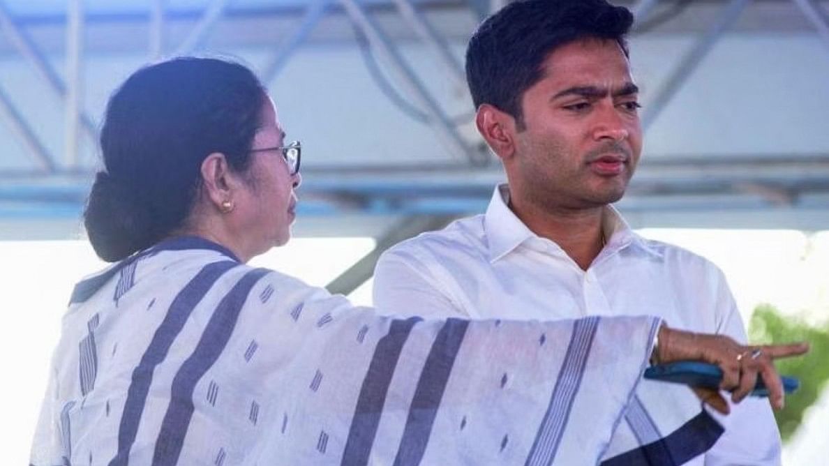 <div class="paragraphs"><p>TMC General Secretary Abhishek Banerjee with West Bengal Chief Minister Mamata Banerjee.</p></div>