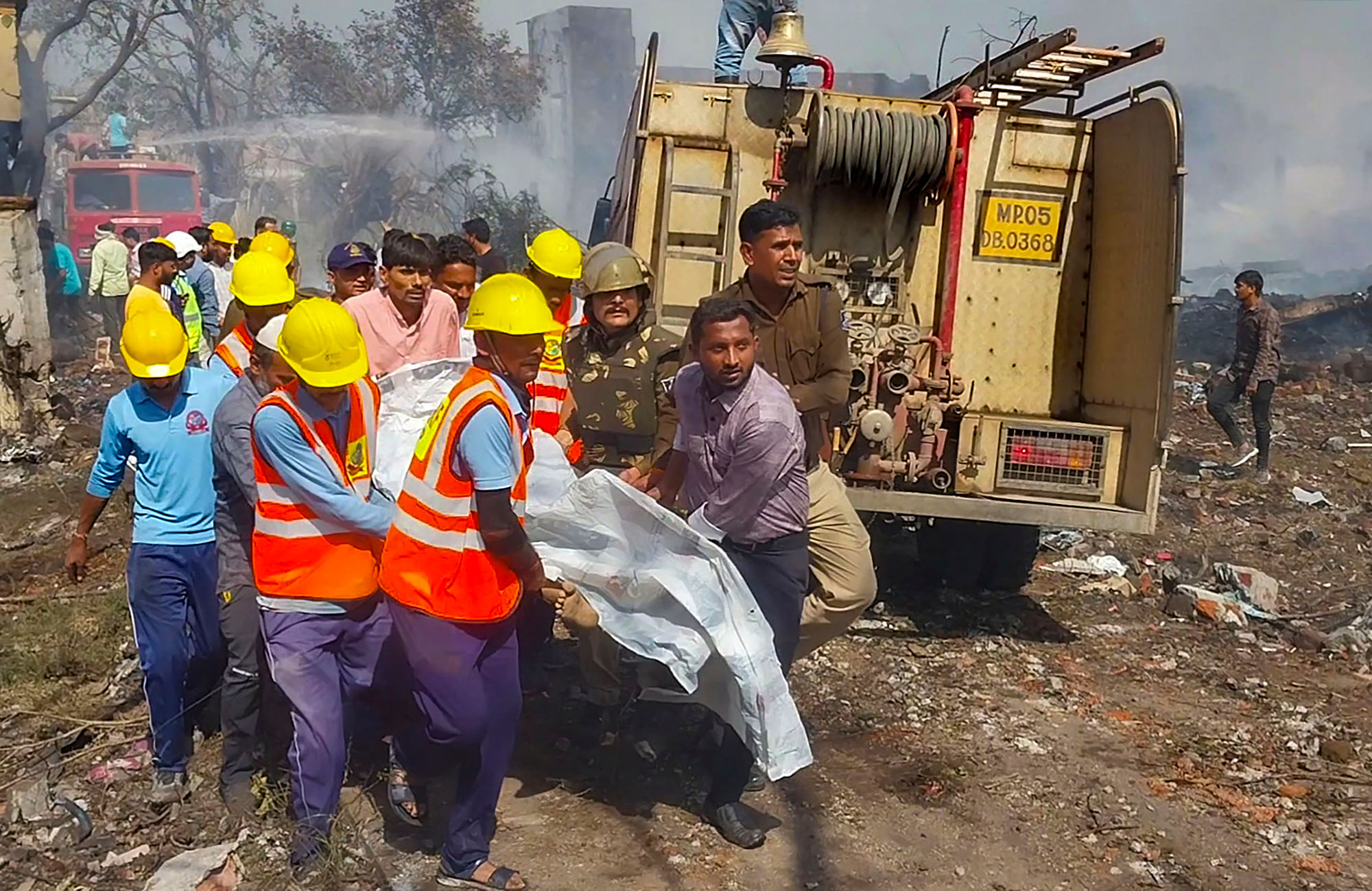 <div class="paragraphs"><p>Rescue work underway after blast and fire at a firecracker factory, in Harda, Madhya Pradesh</p></div>