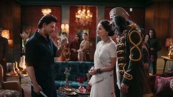 <div class="paragraphs"><p>Shah Rukh Khan, Alia Bhatt and Ranbir Kapoor in a still from the ad.</p></div>