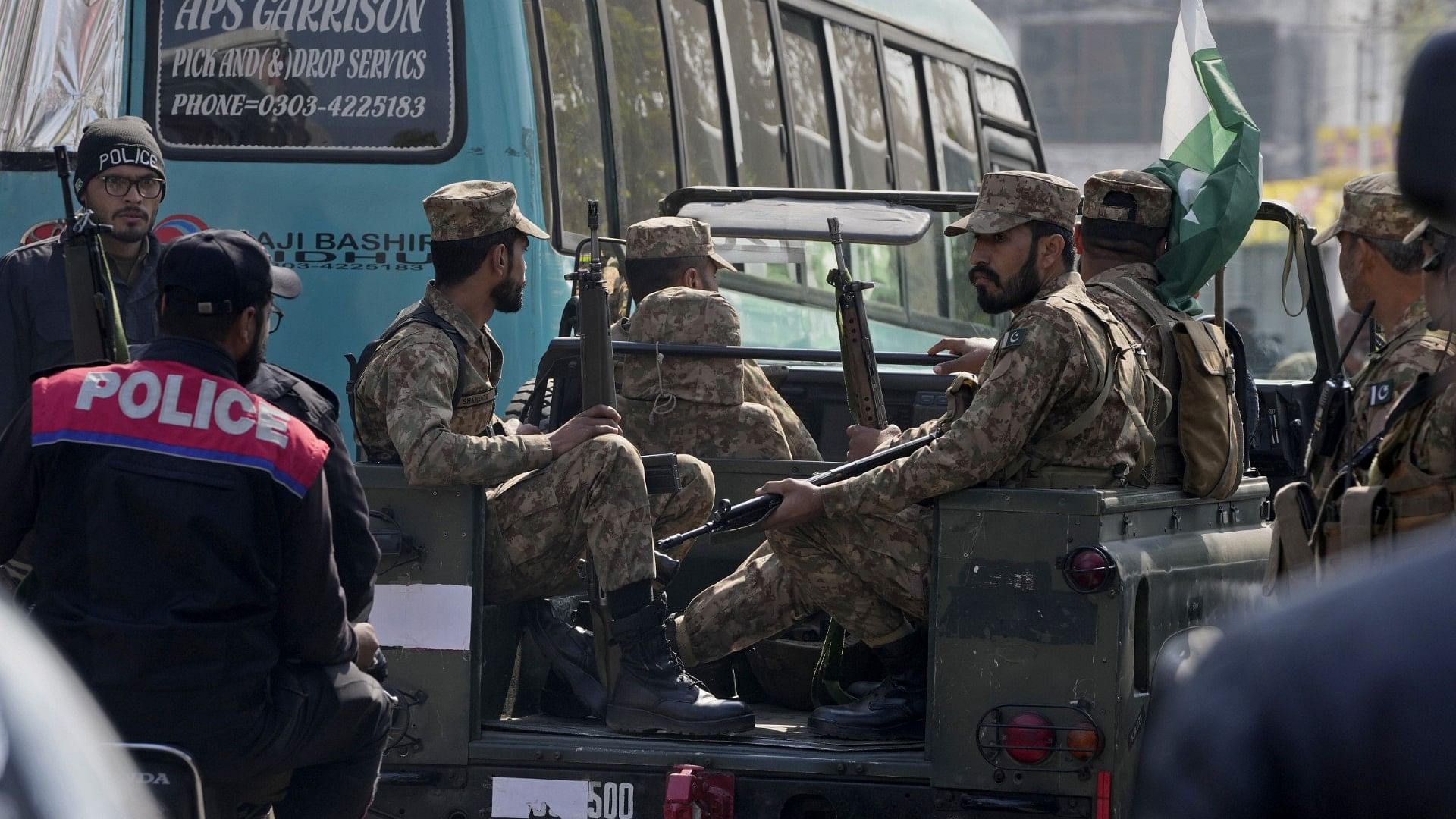 <div class="paragraphs"><p>Army soldiers patrol the vicinity of the polling material distribution centre to ensure security ahead of the 8 February general elections in Lahore.</p></div>