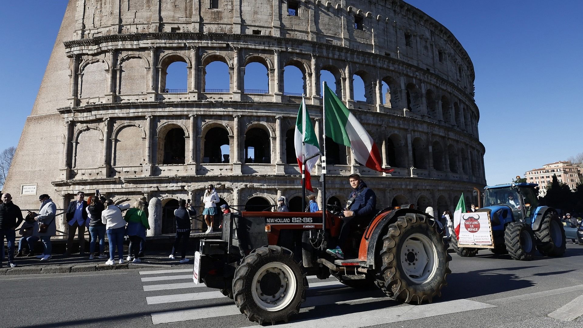 <div class="paragraphs"><p>Tractors passes in front of the Coliseum as farmers protest continues in Rome, Italy.</p></div>