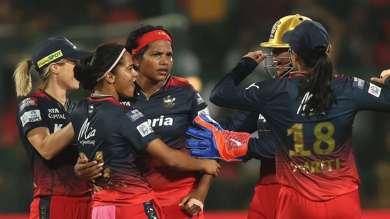 <div class="paragraphs"><p>Shobana Asha  of Royal Challengers Bangalore is congratulated for getting the wicket of Tahlia McGrath of UP Warriorz during match two of the Women’s Premier League 2024.</p></div>