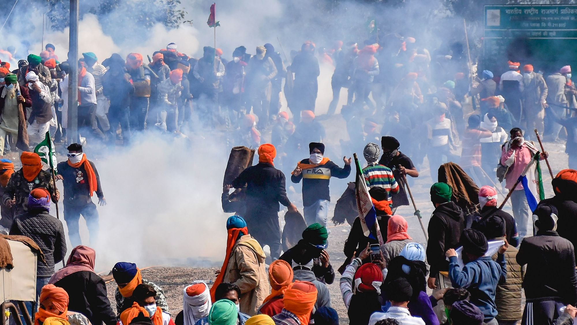 <div class="paragraphs"><p>Farmers face tear gas near the Punjab-Haryana Shambhu border on Wednesday, 14 February, during their 'Delhi Chalo' protest march.&nbsp;</p></div>