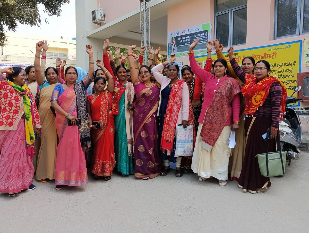 Why are ASHA women not celebrating their inclusion in one of the government's flagship schemes?