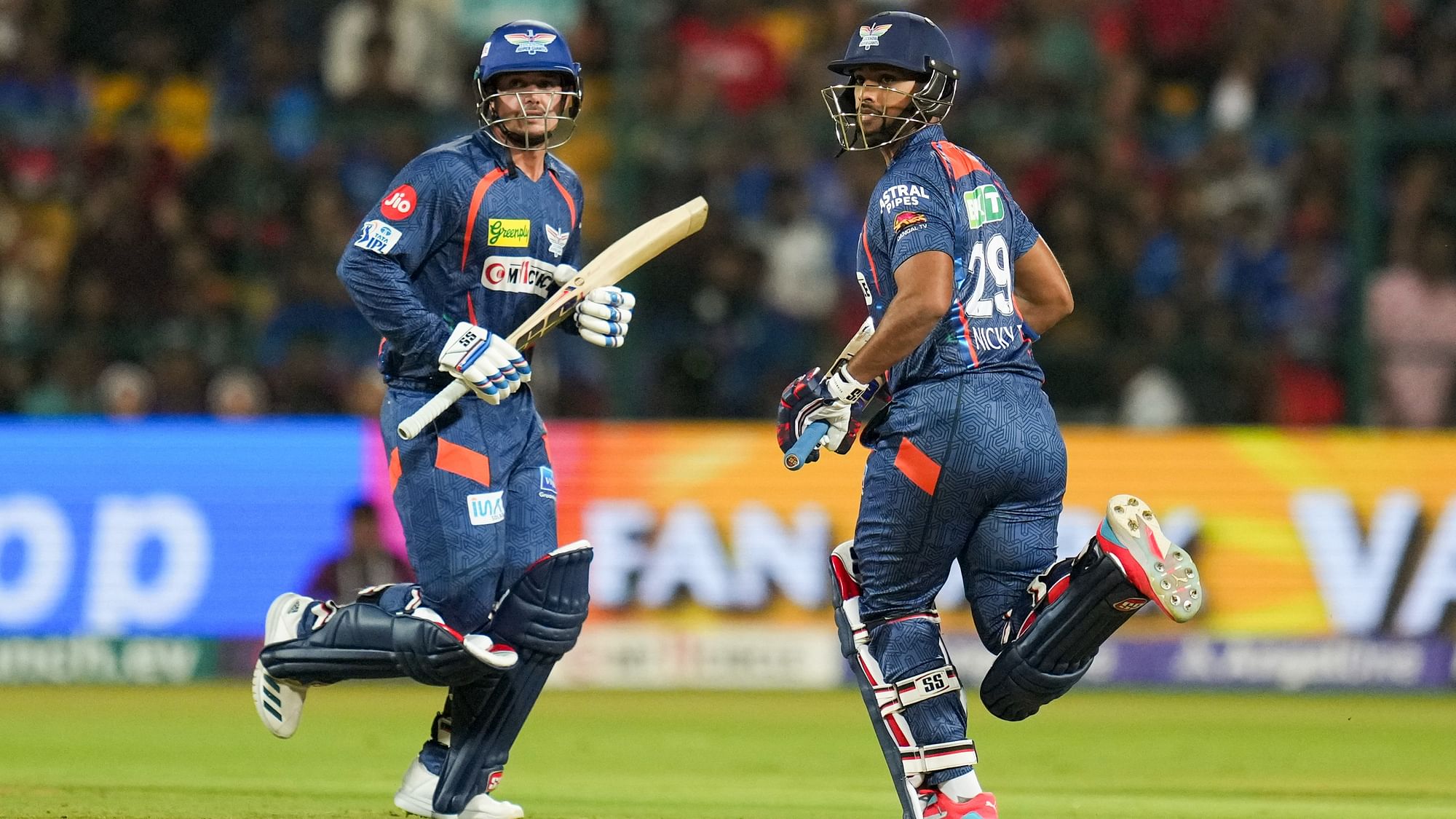 <div class="paragraphs"><p>Bengaluru: Lucknow Super Giants batter Nicholas Pooran and Quinton de Kock run between the wickets during the Indian Premier League (IPL) 2024 T20 cricket match between Royal Challengers Bengaluru and Lucknow Super Giants, at M Chinnaswamy Stadium, in Bengaluru, Tuesday, 2 April, 2024.</p></div>