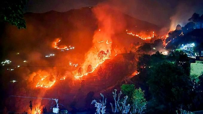 <div class="paragraphs"><p>Forest fires raging through most parts of Uttarakhand for the past few days.</p></div>