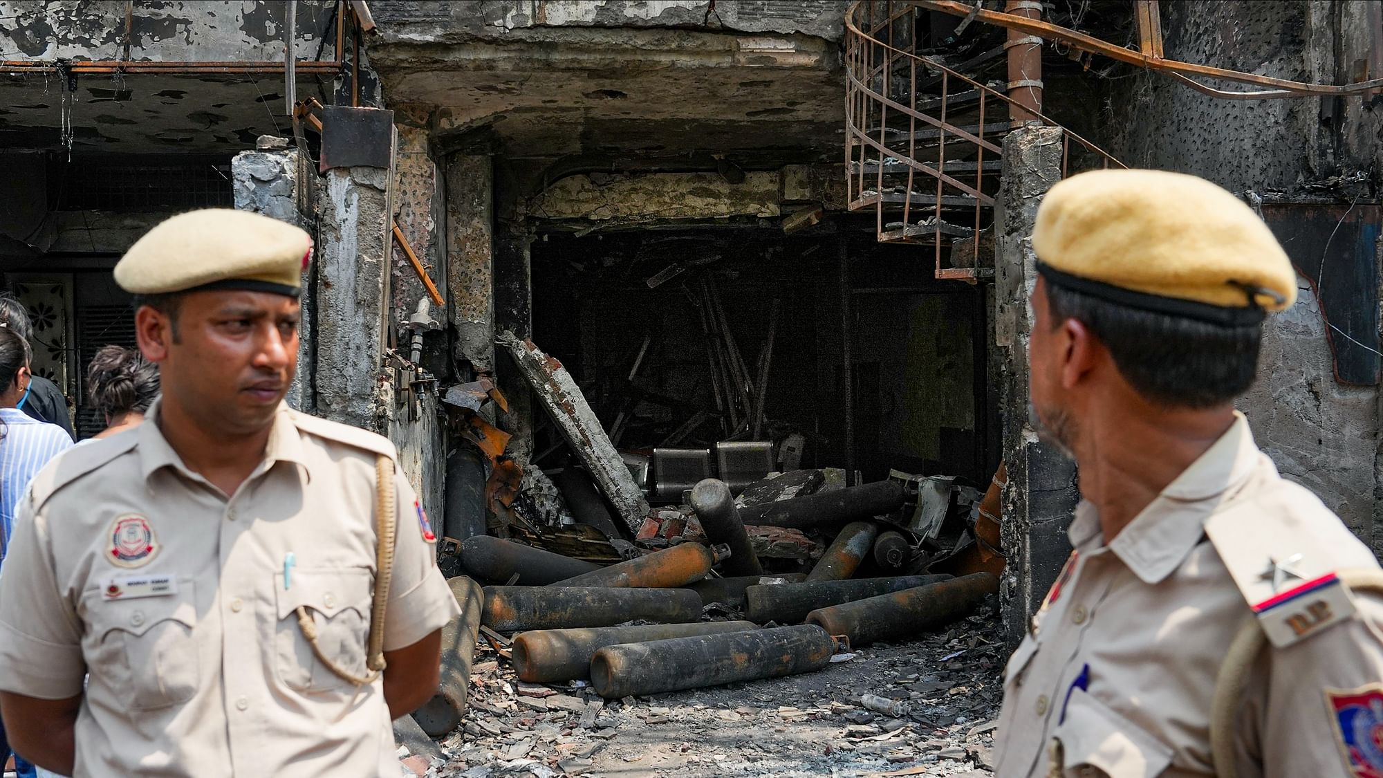 <div class="paragraphs"><p>Forensic team investigates at the site of the fire at the Baby Care Hospital, at Vivek Vihar.&nbsp;</p></div>
