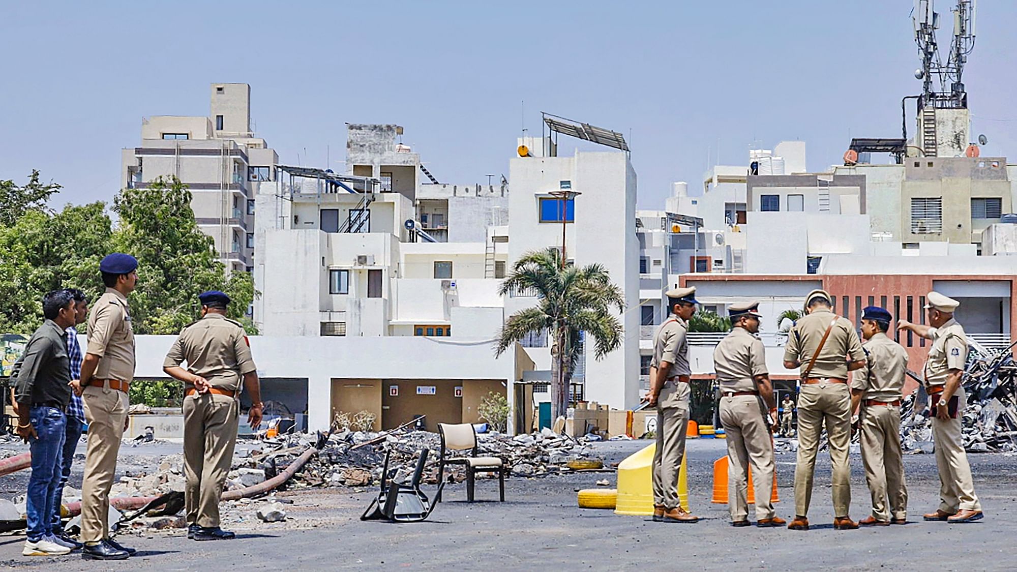 <div class="paragraphs"><p>Rajkot: Brijesh Kumar Jha, new Rajkot Commissioner of Police, visits the game zone site where at least 27 were killed in a fire on Saturday evening, in Rajkot, Tuesday, May 28, 2024.</p></div>