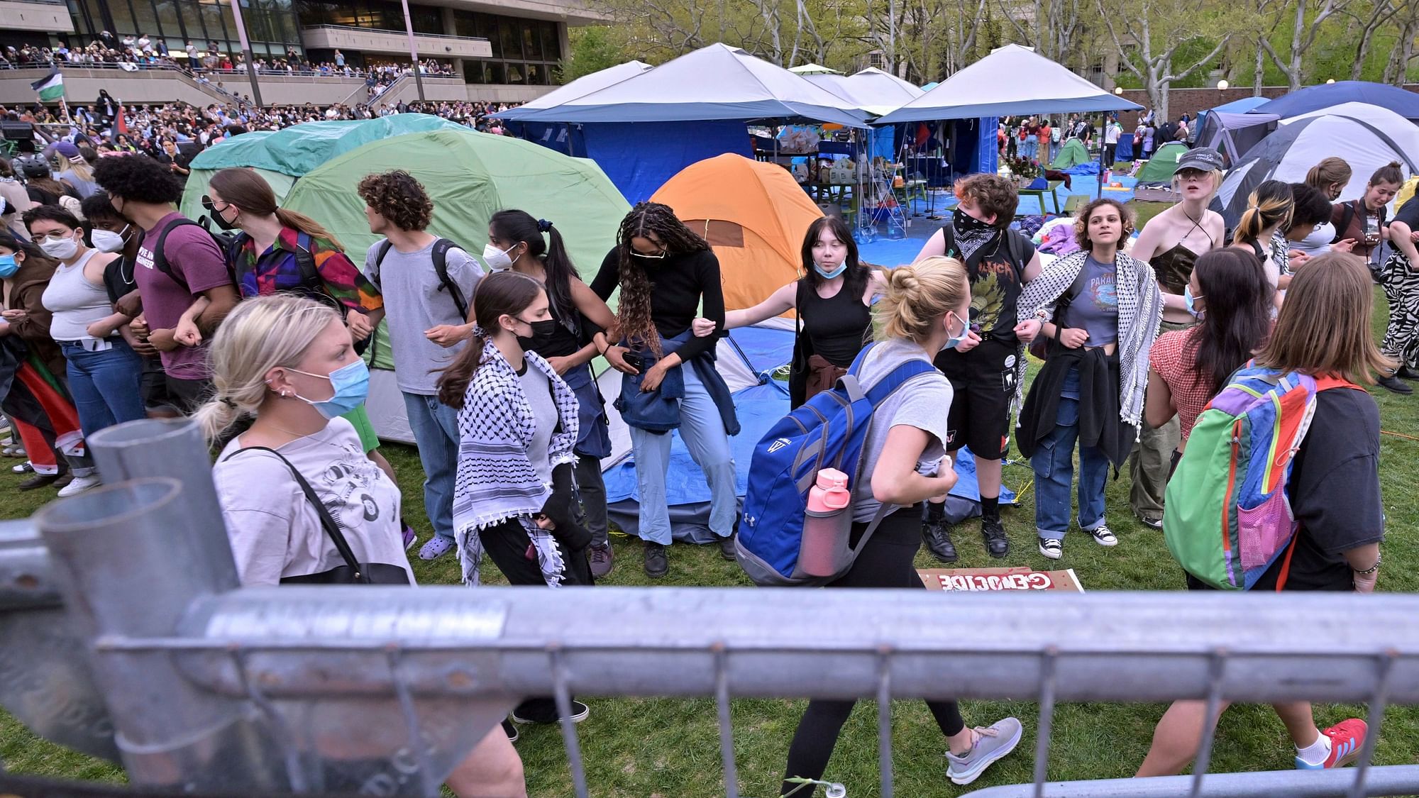 <div class="paragraphs"><p>Protesters at MIT, Cambridge stormed and breached barriers to join the pro-Palestinian encampment on 6 May.</p></div>