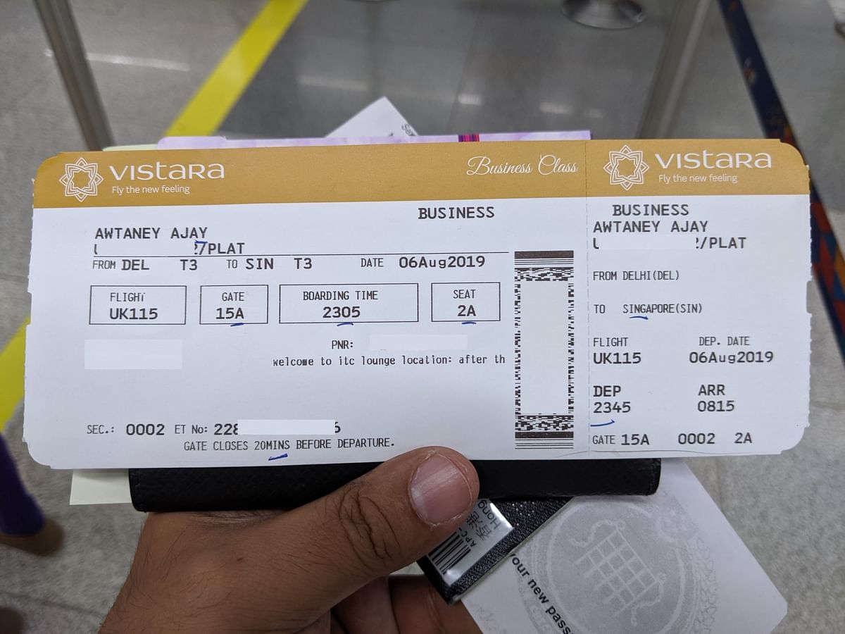 This is an edited photo, the original boarding pass is for Singapore and does not show Gandhi's name on it.