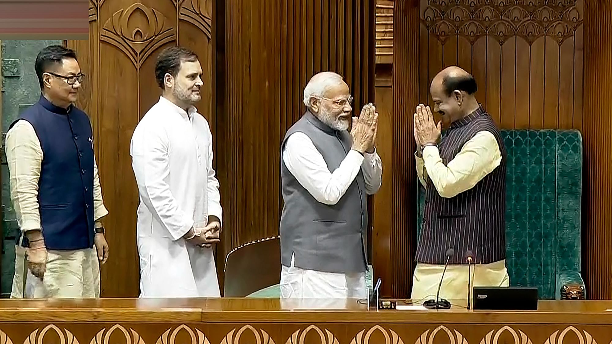 <div class="paragraphs"><p>Prime Minister Narendra Modi greets Om Birla after the latter was elected as the Speaker of the House during the first session of the 18th Lok Sabha, in New Delhi, Wednesday, June 26, 2024. Leader of the Opposition Rahul Gandhi and Union Minister for Parliamentary Affairs Kiren Rijiju are also seen. </p></div>
