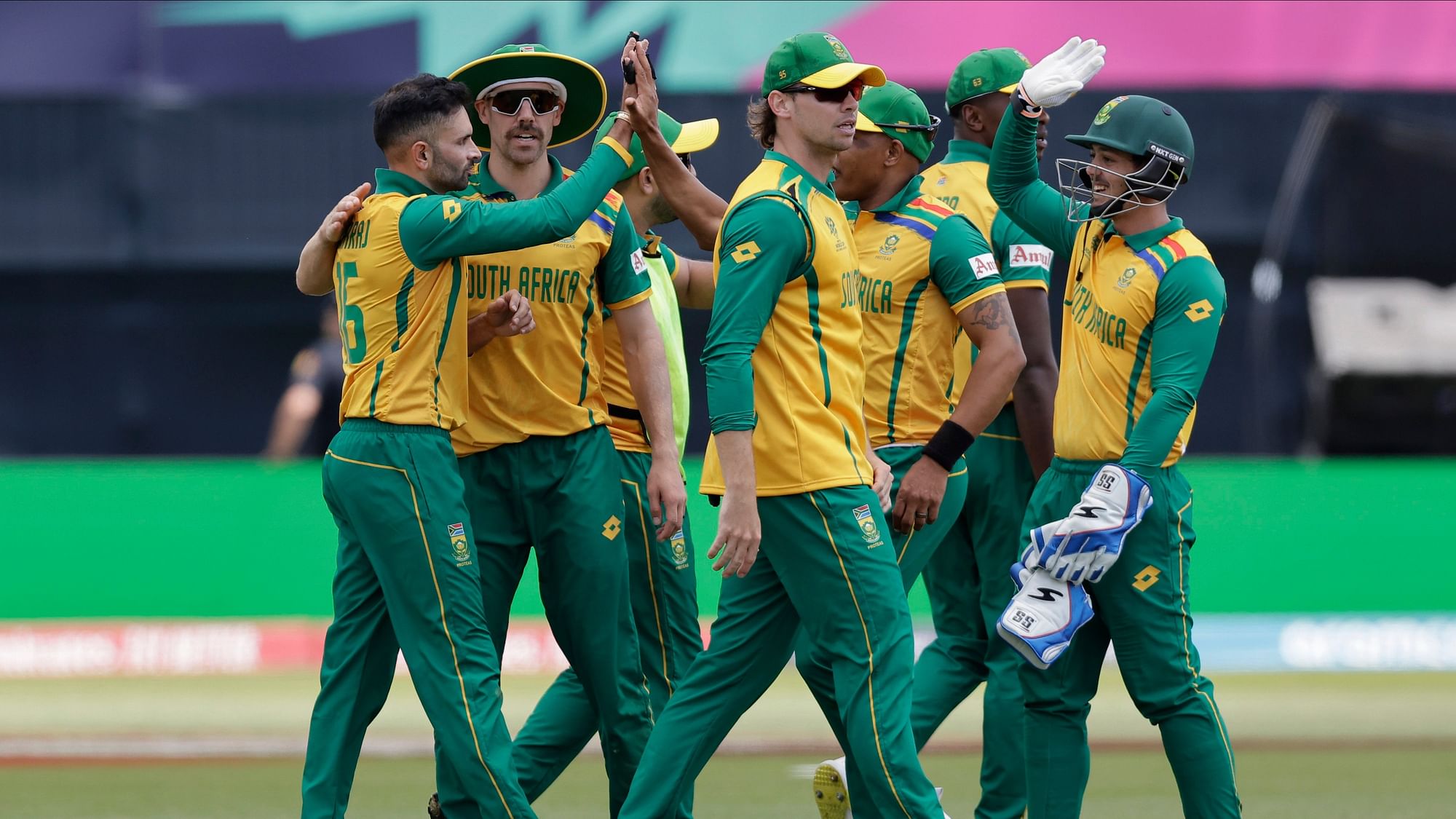 <div class="paragraphs"><p>South Africas Keshav Maharaj, left, celebrates with teammates after the dismissal of Bangladeshs Mahmudullah Riyad during the ICC Mens T20 World Cup cricket match between Bangladesh and South Africa at the Nassau County International Cricket Stadium in Westbury, New York</p></div>