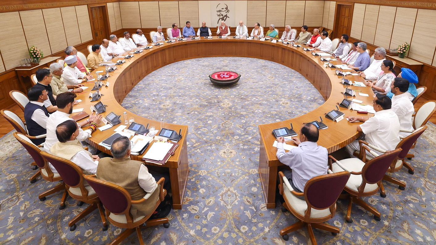 <div class="paragraphs"><p>New Delhi: Prime Minister Narendra Modi chairs the first meeting of his new Cabinet, attended by the newly-inducted ministers, at the prime ministers 7, Lok Kalyan Marg residence</p></div>