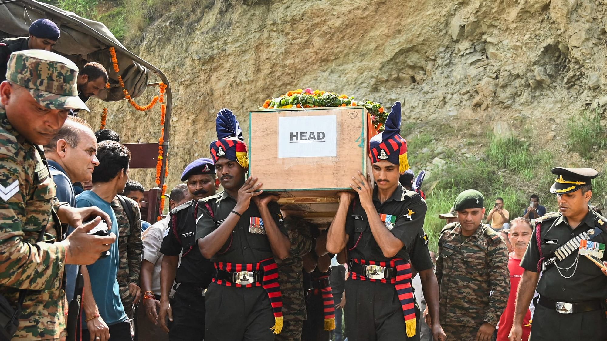 <div class="paragraphs"><p>Tehri Garhwal: Mortal remains of Rifleman Adarsh Negi, who was martyred in the recent terror attack in Jammu and Kashmir�s Kathua district, being brought to his village for his last rites, in Tehri Garhwal district, Wednesday, July 10, 2024.</p></div>