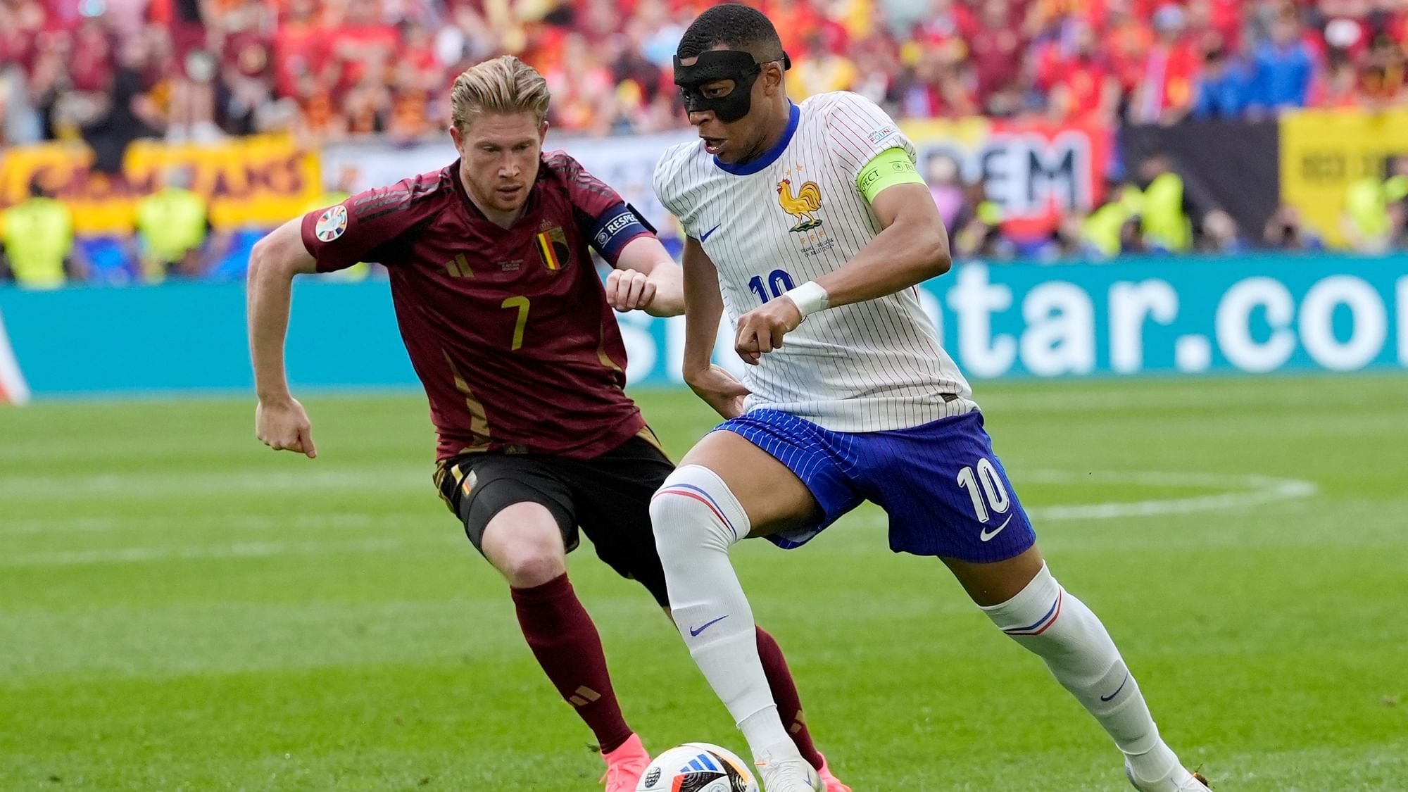 <div class="paragraphs"><p>Kylian Mbappe of France and Belgium's Kevin De Bruyne challenge during a round of sixteen match between France and Belgium at the Euro 2024 soccer tournament in Duesseldorf, Germany,</p></div>