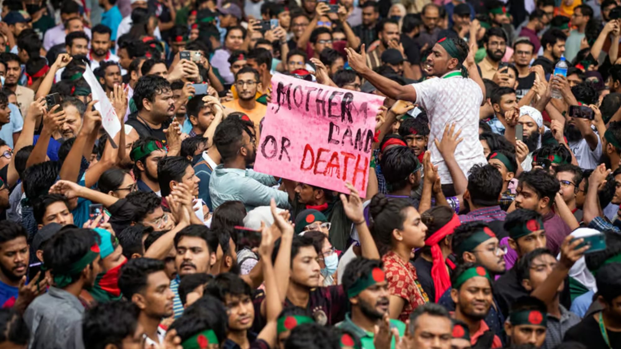 <div class="paragraphs"><p>Activists take part in a protest march as they demand justice for victims arrested and killed in the recent countrywide violence in Dhaka.</p></div>