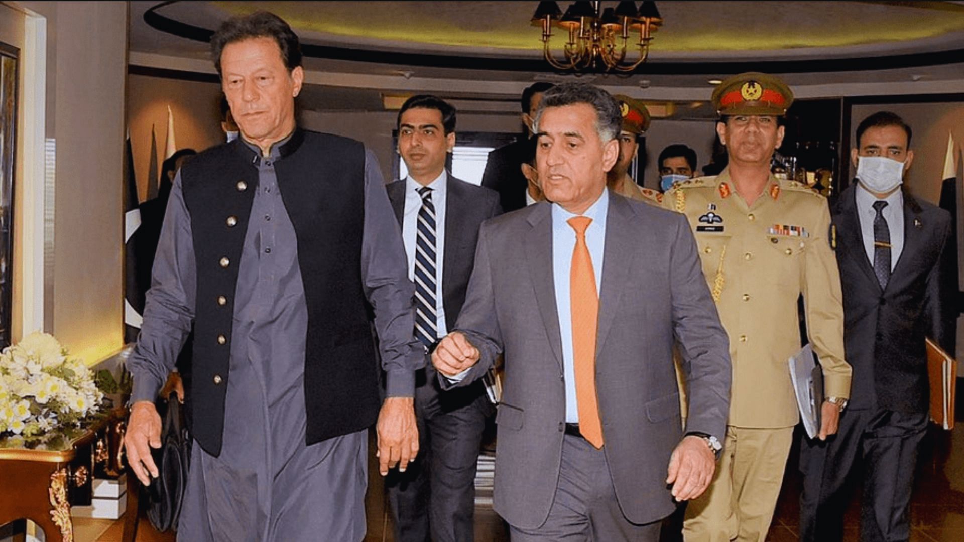 <div class="paragraphs"><p>File photo of Lt Gen (retd) Faiz Hameed (right) while he was the country’s spymaster with then prime minister Imran Khan.</p></div>