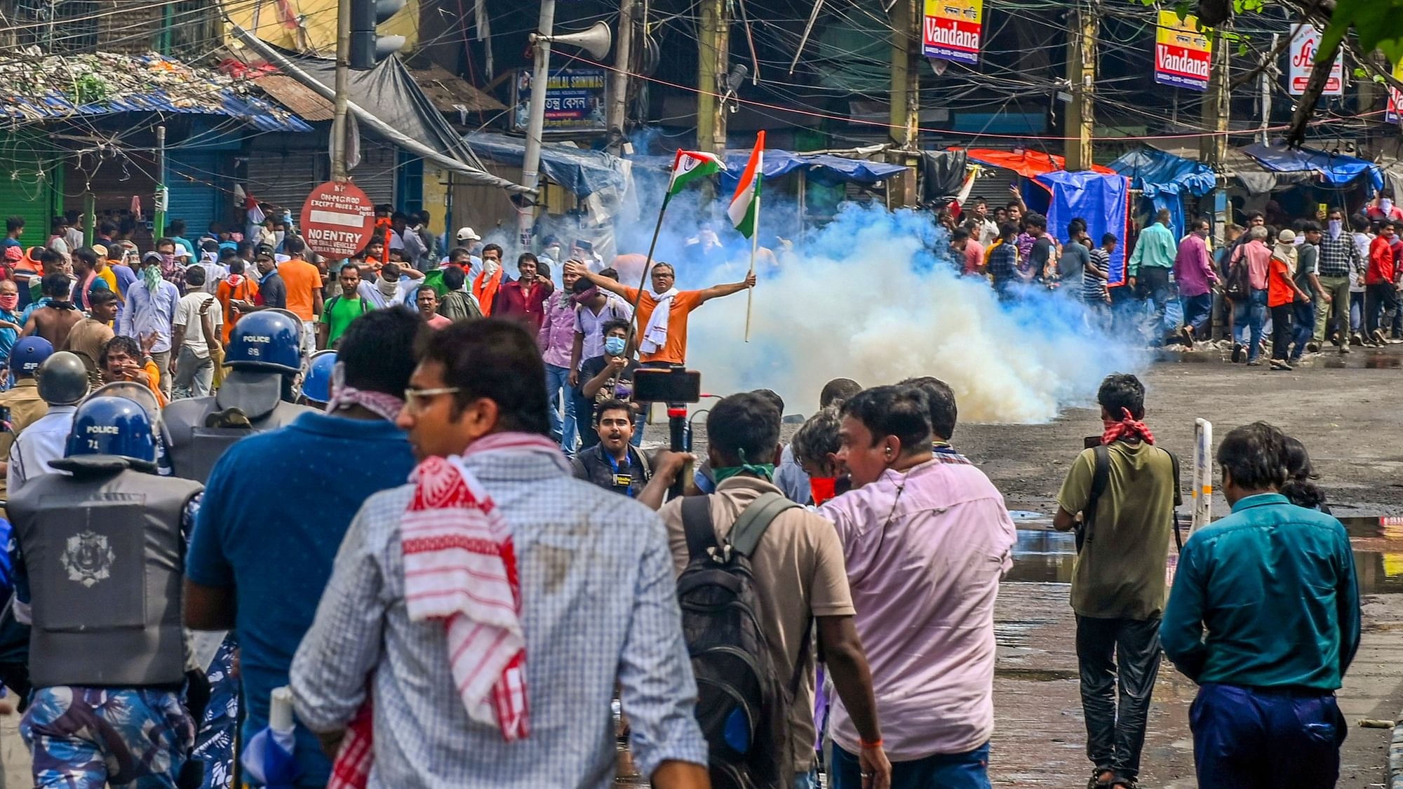 <div class="paragraphs"><p>A man holds the national flag during the march.&nbsp;</p></div>