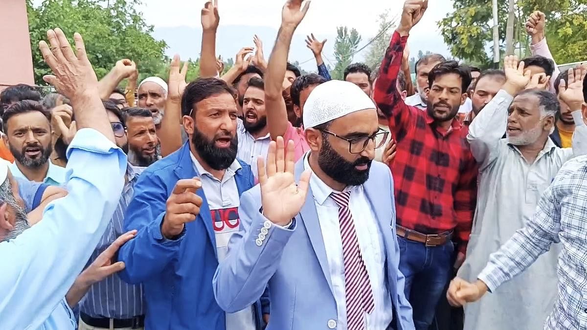 <div class="paragraphs"><p>Former Jamaat-e-Islami leader Sayar Ahmad Reshi with supporters before filing his nomination from Kulgam ahead of J&amp;K Assembly polls, in Kulgam.</p></div>