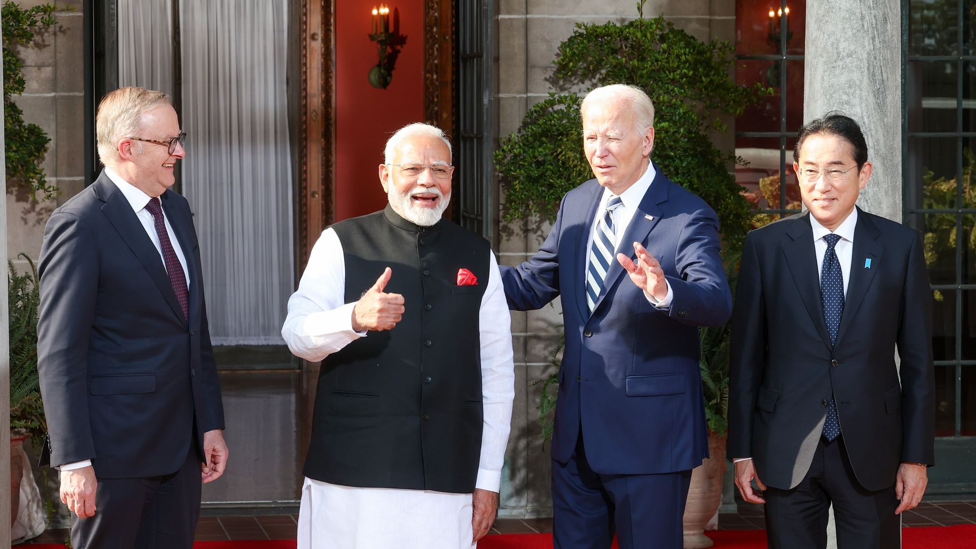 <div class="paragraphs"><p>Leaders of Quad nations in a group photo.</p></div>