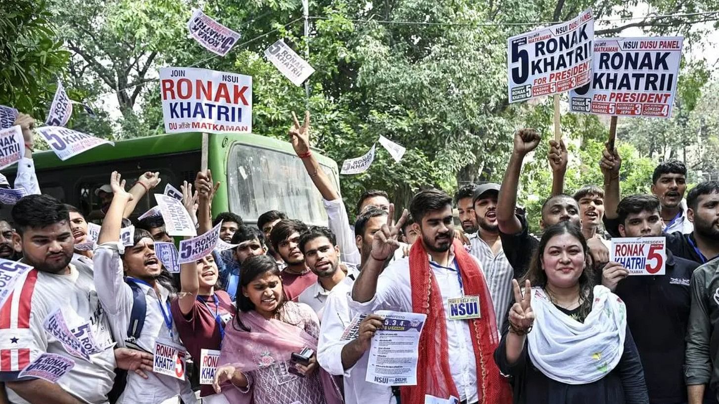 <div class="paragraphs"><p>National Students’ Union of India presidential candidate Ronak Khatri with supporters during the final day of campaigning for the DUSU election, at the university’s North Campus in New Delhi on September 25.</p></div>