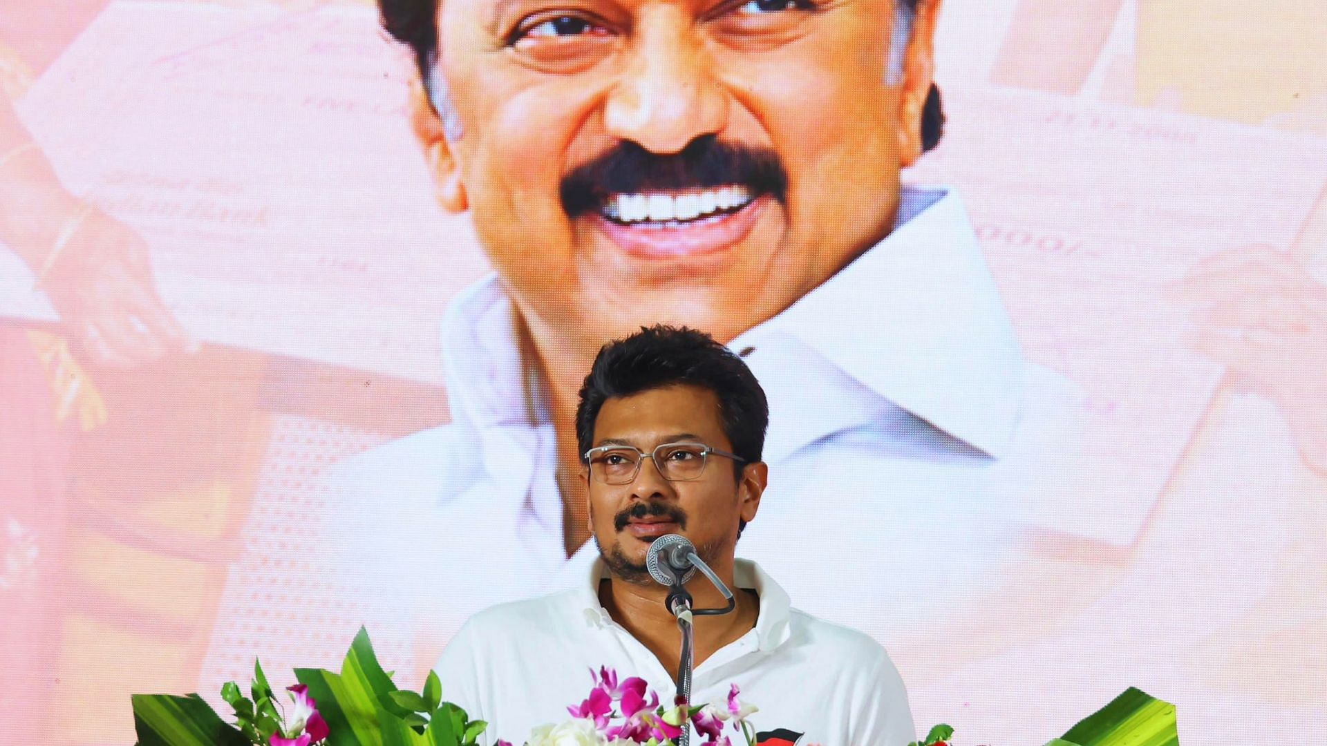 <div class="paragraphs"><p>Udhayanidhi Stalin addressing a gathering. In the background is a picture of his father and Tamil Nadu CM MK Stalin.</p></div>