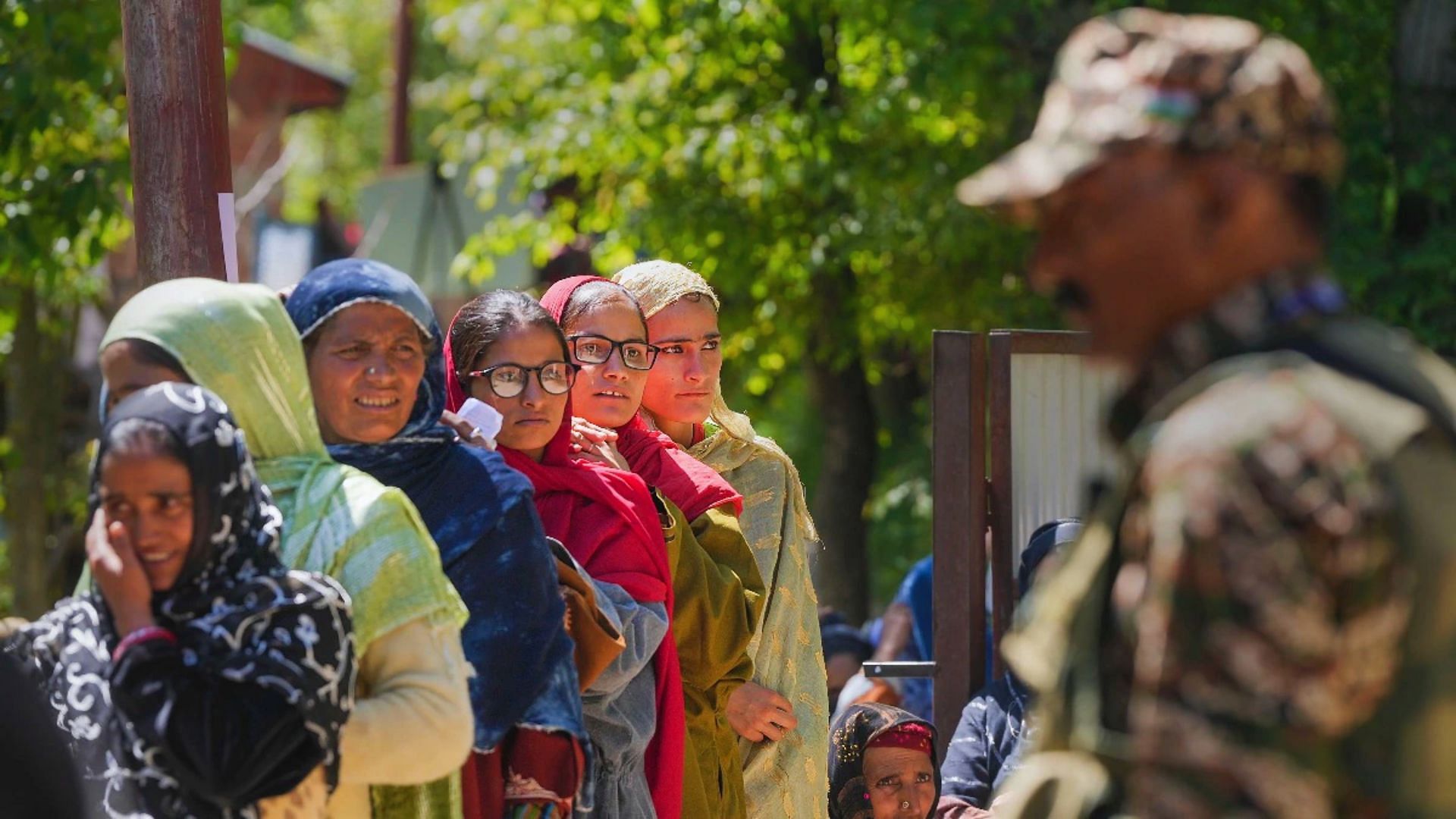 <div class="paragraphs"><p>People in South Kashmir wait in a queue to cast their votes at a polling booth at the Nandimarg area in Kulgam district.</p></div>