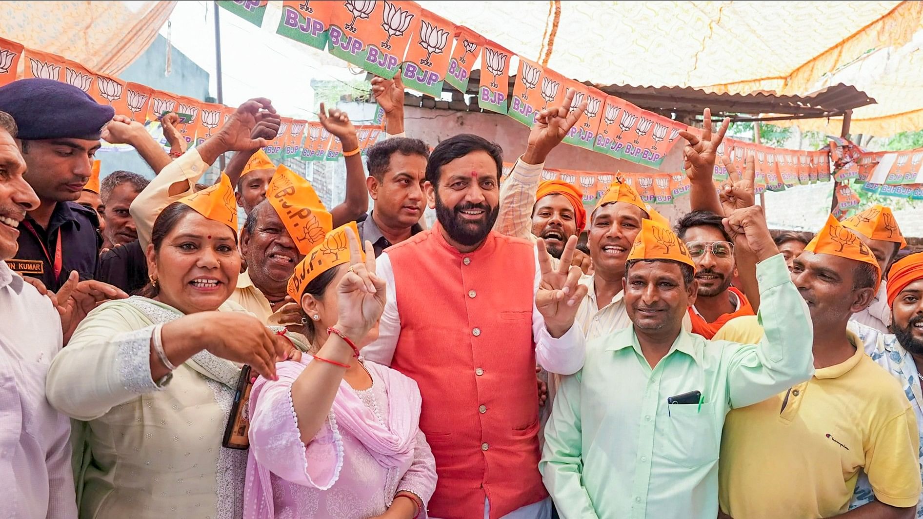 <div class="paragraphs"><p>Haryana CM Nayab Singh Saini with BJP supporters after winning the election.</p></div>