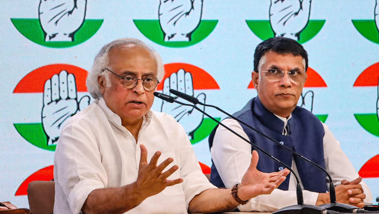 <div class="paragraphs"><p>Congress leaders Jairam Ramesh and Pawan Khera address a press conference at AICC headquarters, in New Delhi.</p></div>