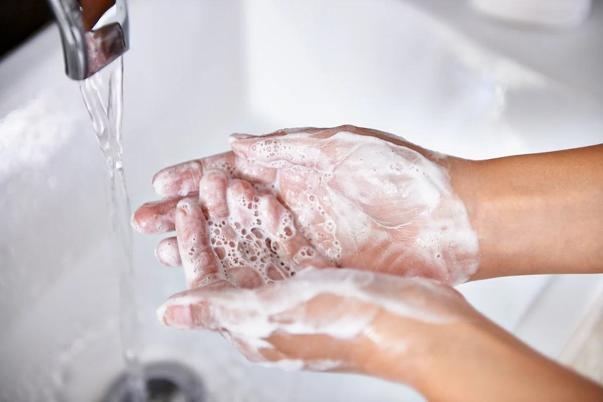 Wash your hands regularly to minimise the risk of contracting the virus.