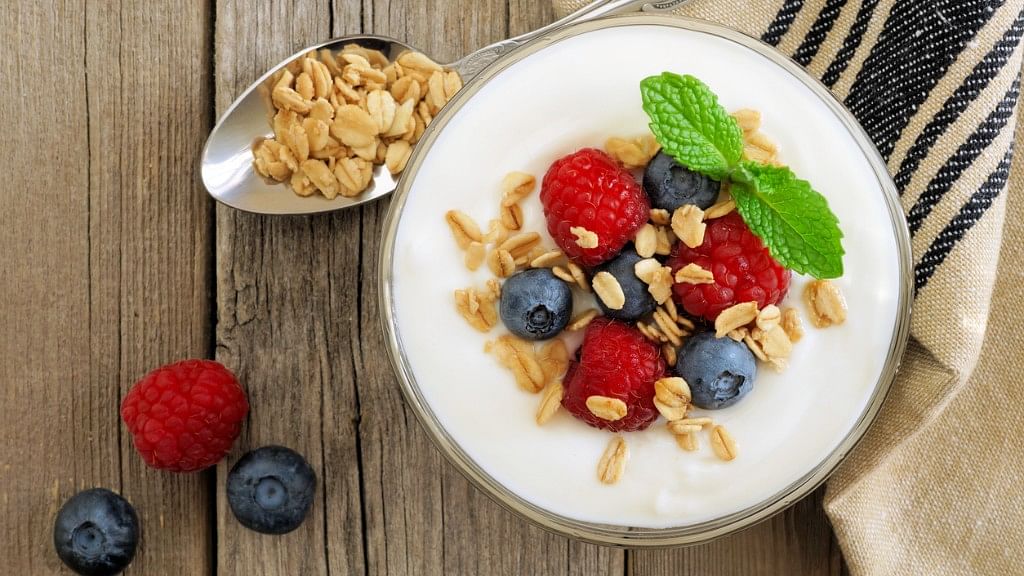 Greek yogurt with fruits and nuts is a great breakfast option.