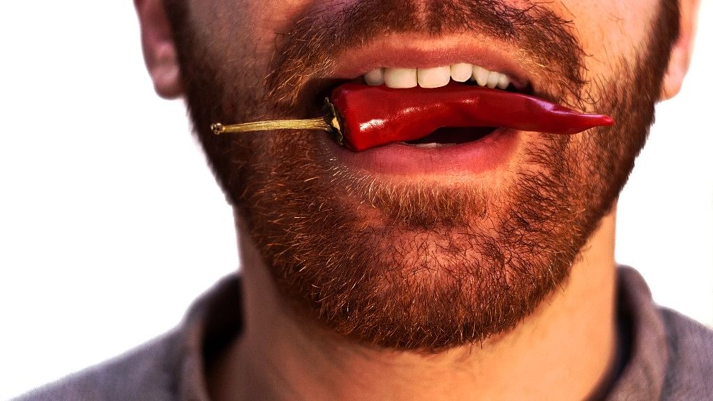 Eating super-hot chili peppers can have painful effects that extend beyond a blazing mouth, doctors warn.