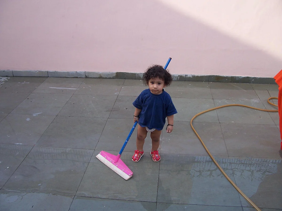 My son is encouraged to take part in chores, breaking down the social construct of “woman’s work.”