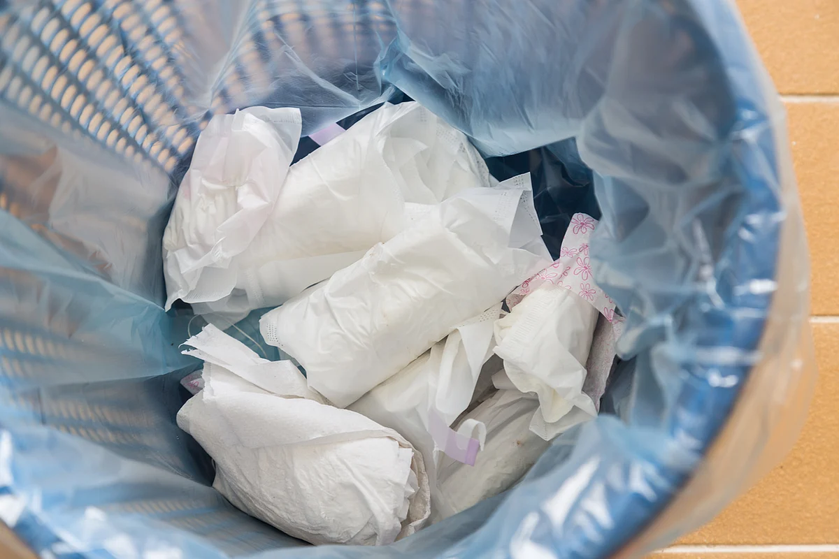The exposed sanitary napkin poses grave health risks for the waste collector.