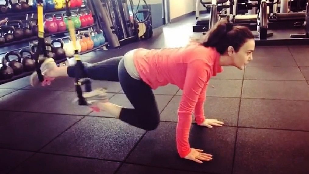 Preity Zinta working out in the gym.
