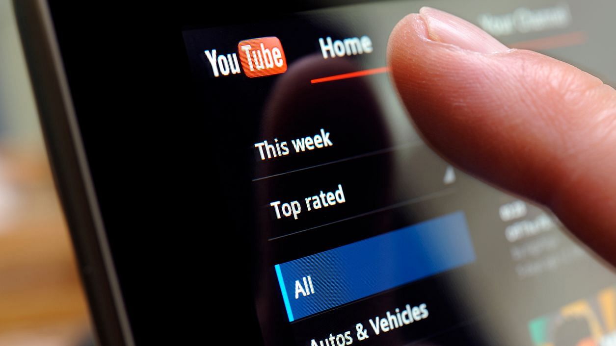 Watching high-spirited videos on YouTube after a long day at work could pep you up a bit, say researchers.