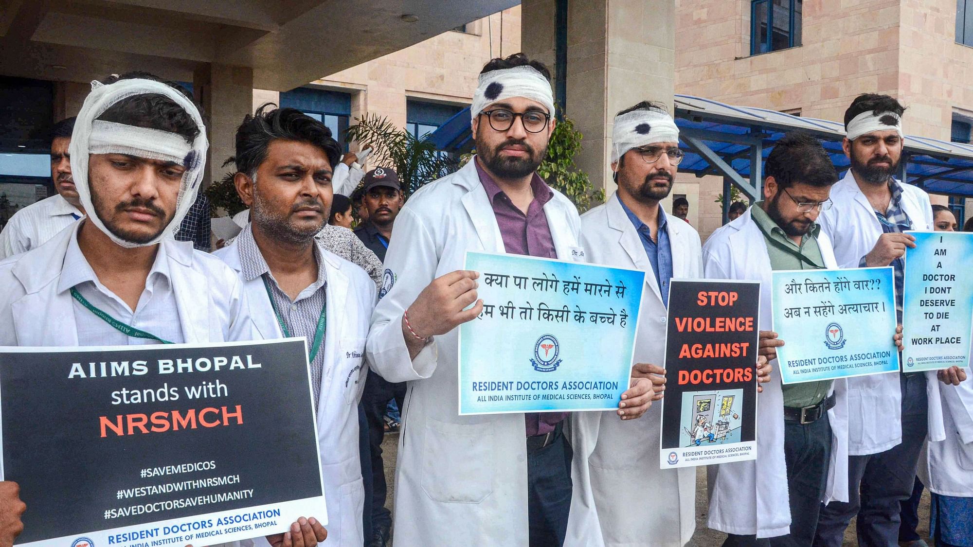 Members of Resident Doctors Association at All India Institute of Medical Sciences in Bhopal express their solidarity in protest against an attack on an interim doctor in Bengal, on Friday, 14 June 2019.