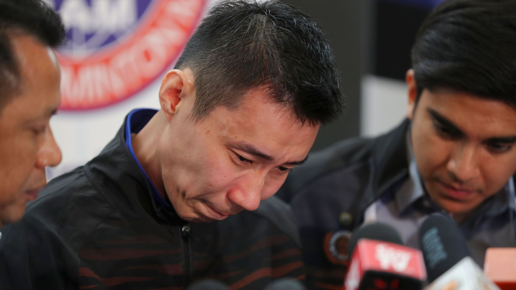 Malaysian badminton player Lee Chong Wei, center, cries during a press conference in Putrajaya, Malaysia, Thursday, 13 June, 2019. 