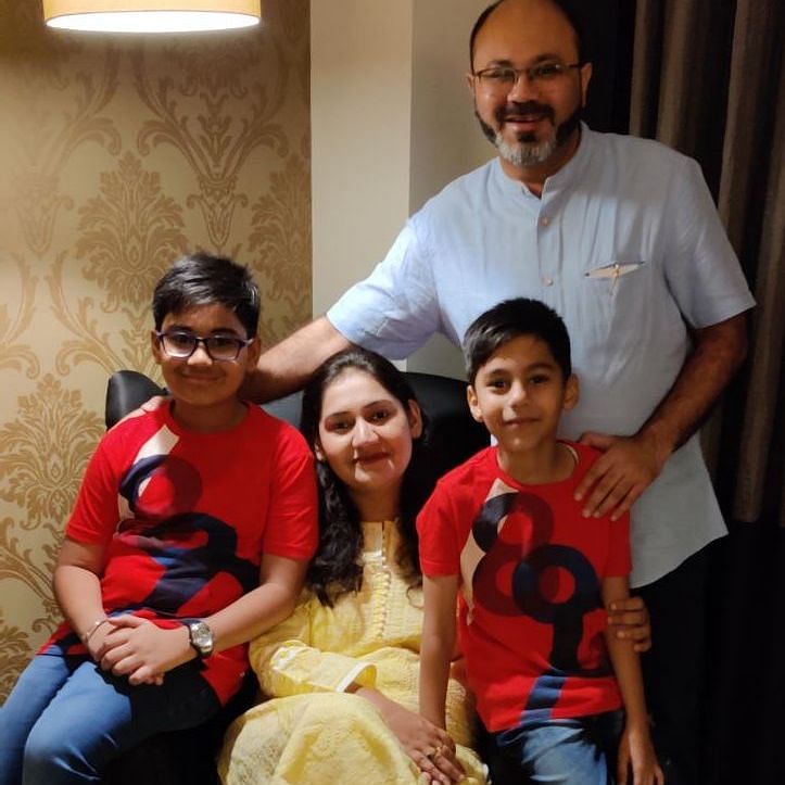 Harsh with his wife and two sons.