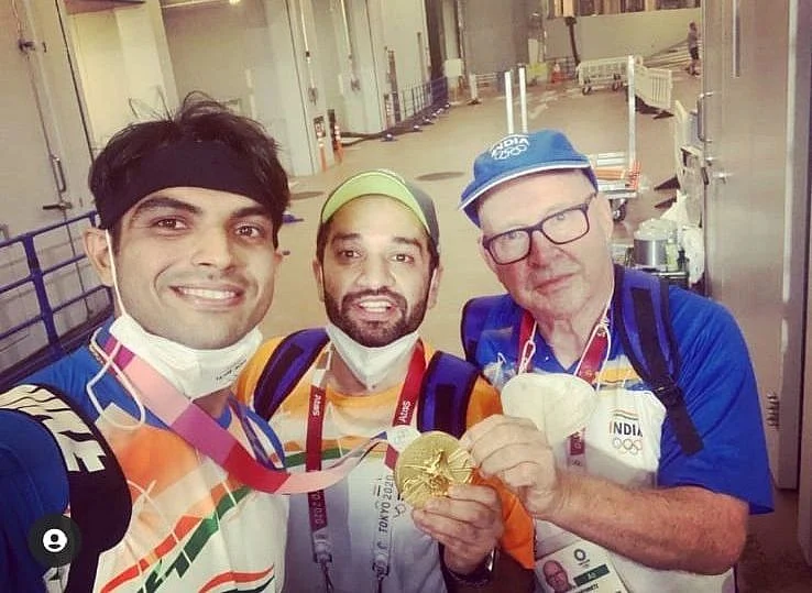 <div class="paragraphs"><p>Neeraj Chopra, Ishaan Marwaha, and Chopra's coach, Klaus Bartonietz after his big Olympic win.</p></div>